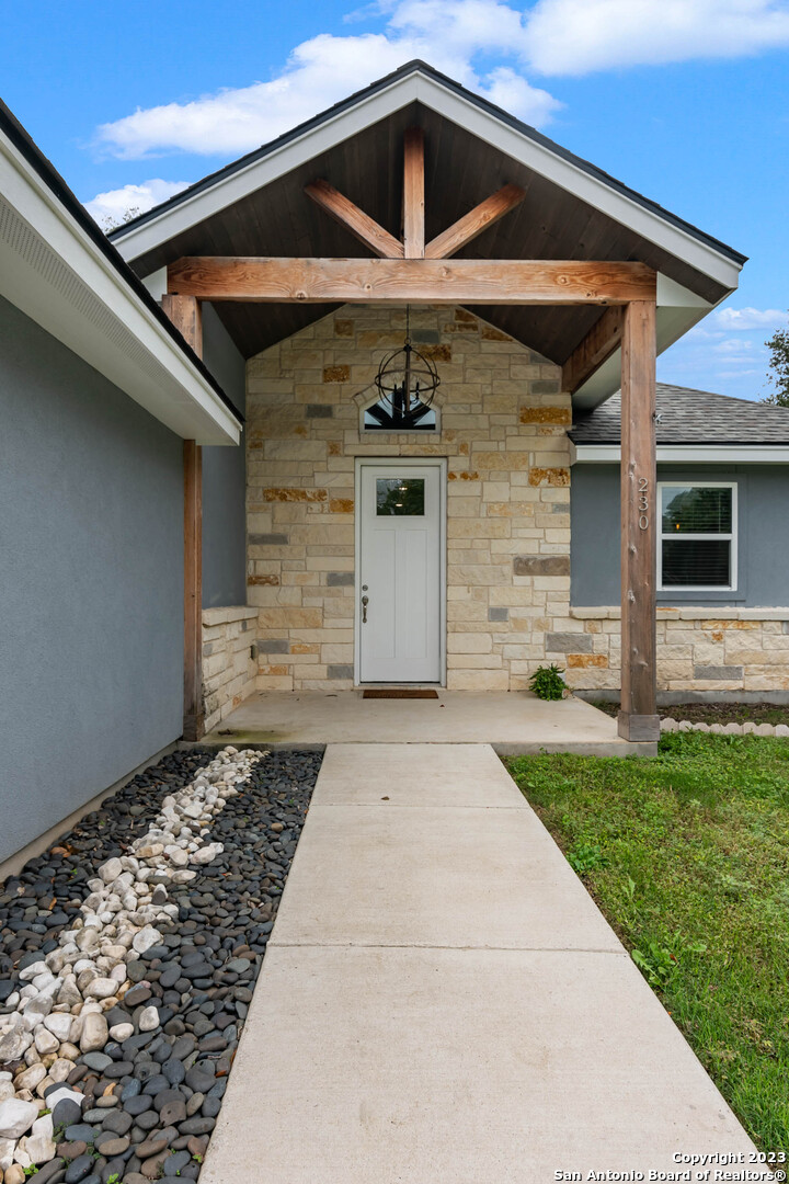 230 Club View West Seguin, TX 78155 - Photo 3 of 24 a front view of a house with a yard