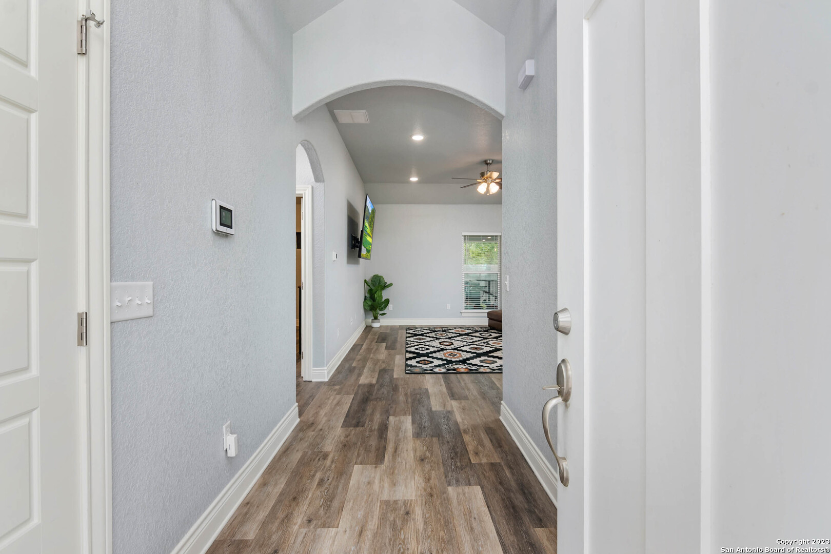 230 Club View West Seguin, TX 78155 - Photo 4 of 24 a view of a hallway and wooden floor
