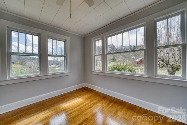 a view of a room with a large window