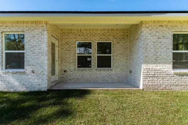 a view of front door of house with outdoor space