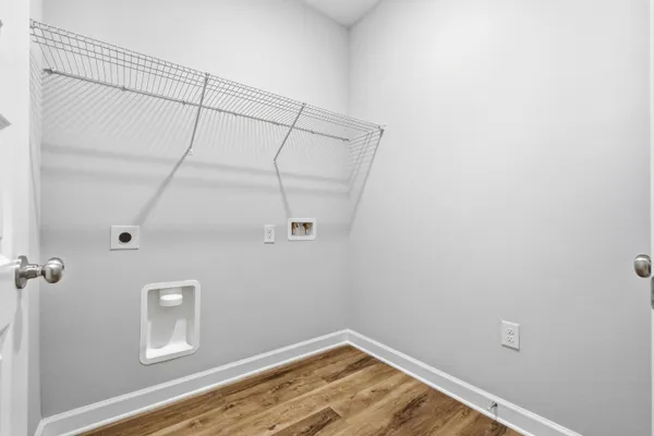 a view of a room with rack on the wall