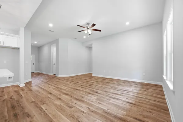 a view of an empty room with a window