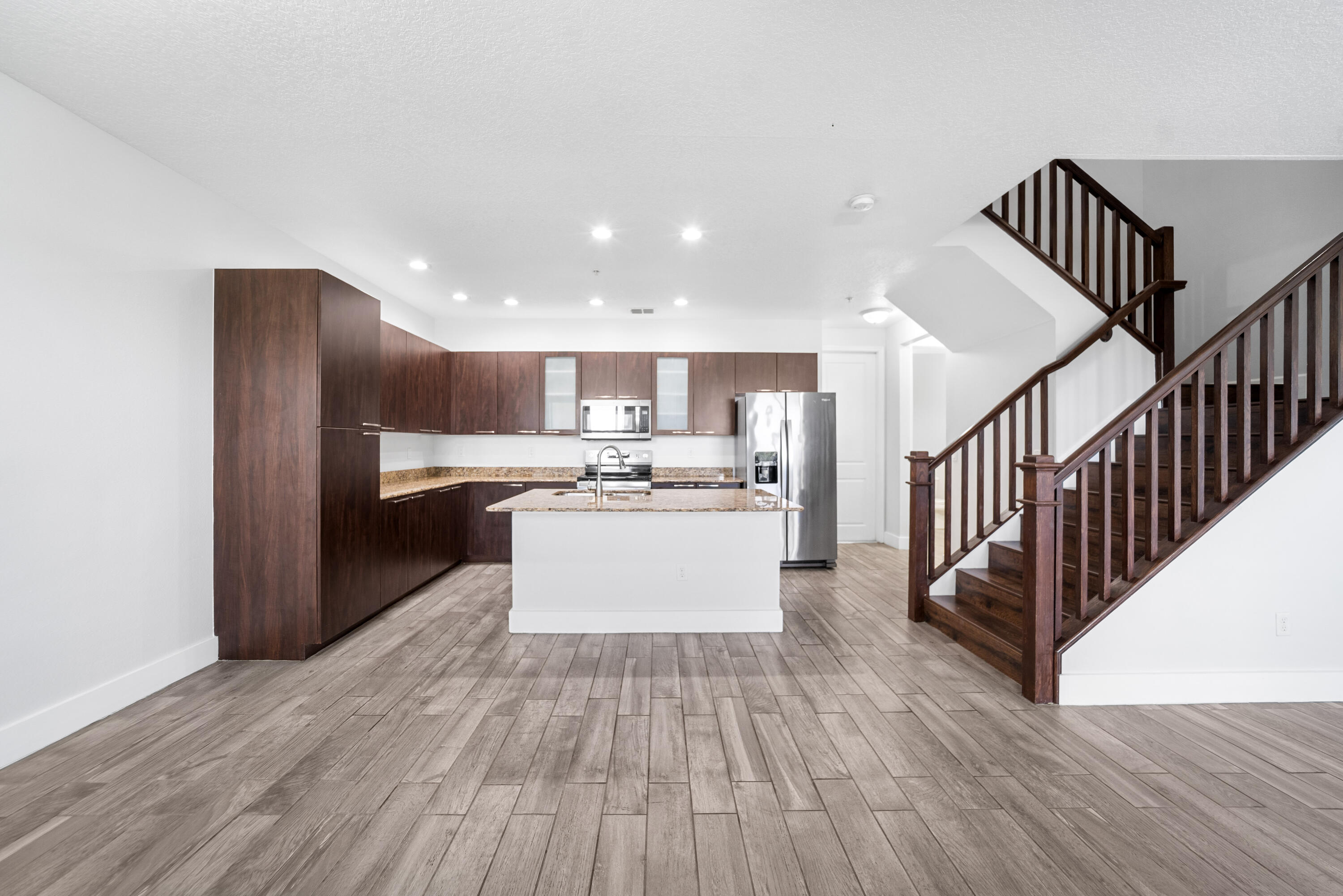 1430 Northwest 48th Lane Boca Raton, FL 33431 - Photo 5 of 54 a view of kitchen with wooden floor and electronic appliances