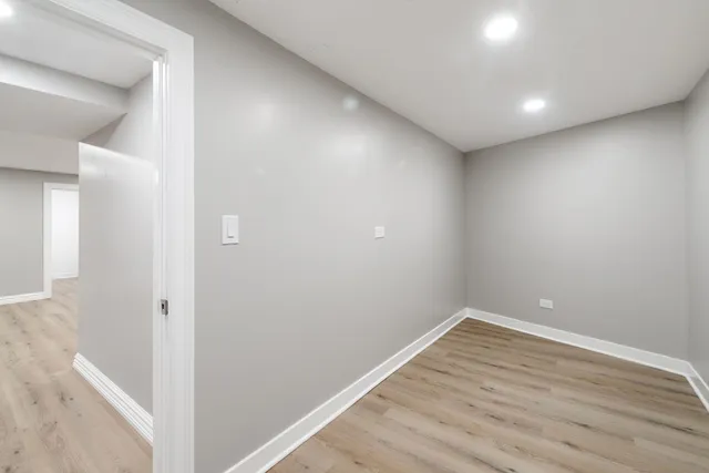 a utility room with cabinets