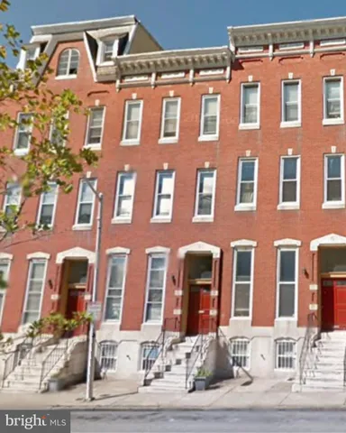 a front view of a multi story building