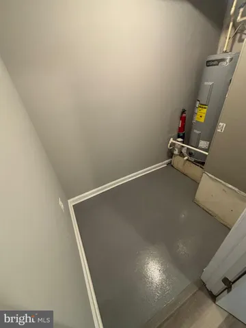 a view of storage and utility room with empty room