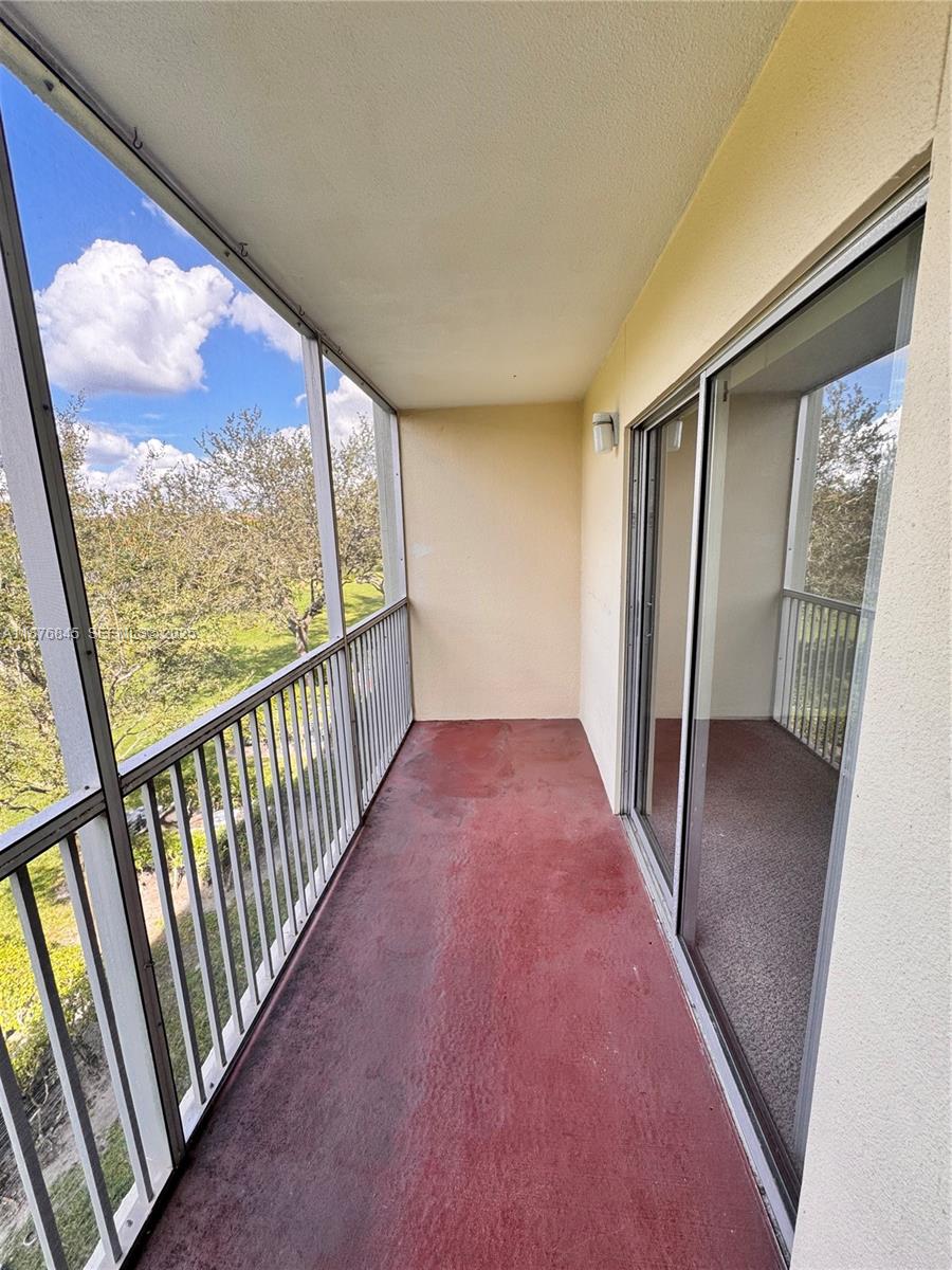 13355 Southwest 9th Court, Unit 310H Pembroke Pines, FL 33027 - Photo 19 of 30 a view of a hallway
