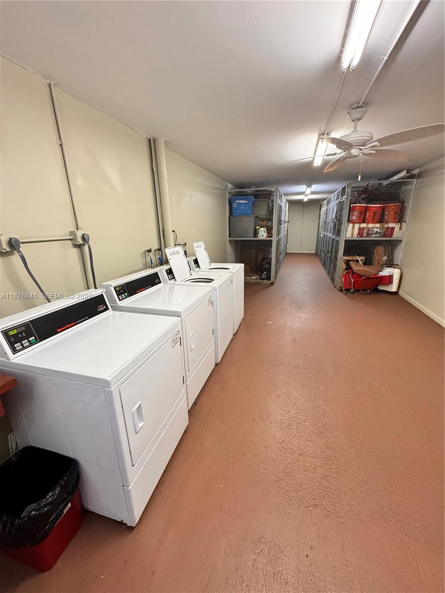 13355 Southwest 9th Court, Unit 310H Pembroke Pines, FL 33027 - Photo 27 of 30 a utility room with dryer and washer
