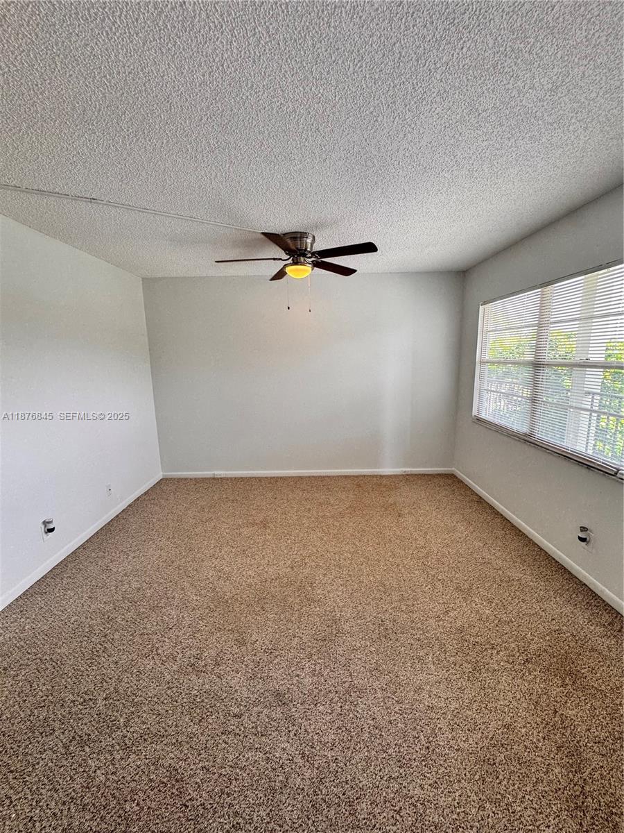 13355 Southwest 9th Court, Unit 310H Pembroke Pines, FL 33027 - Photo 10 of 30 a view of a room with window