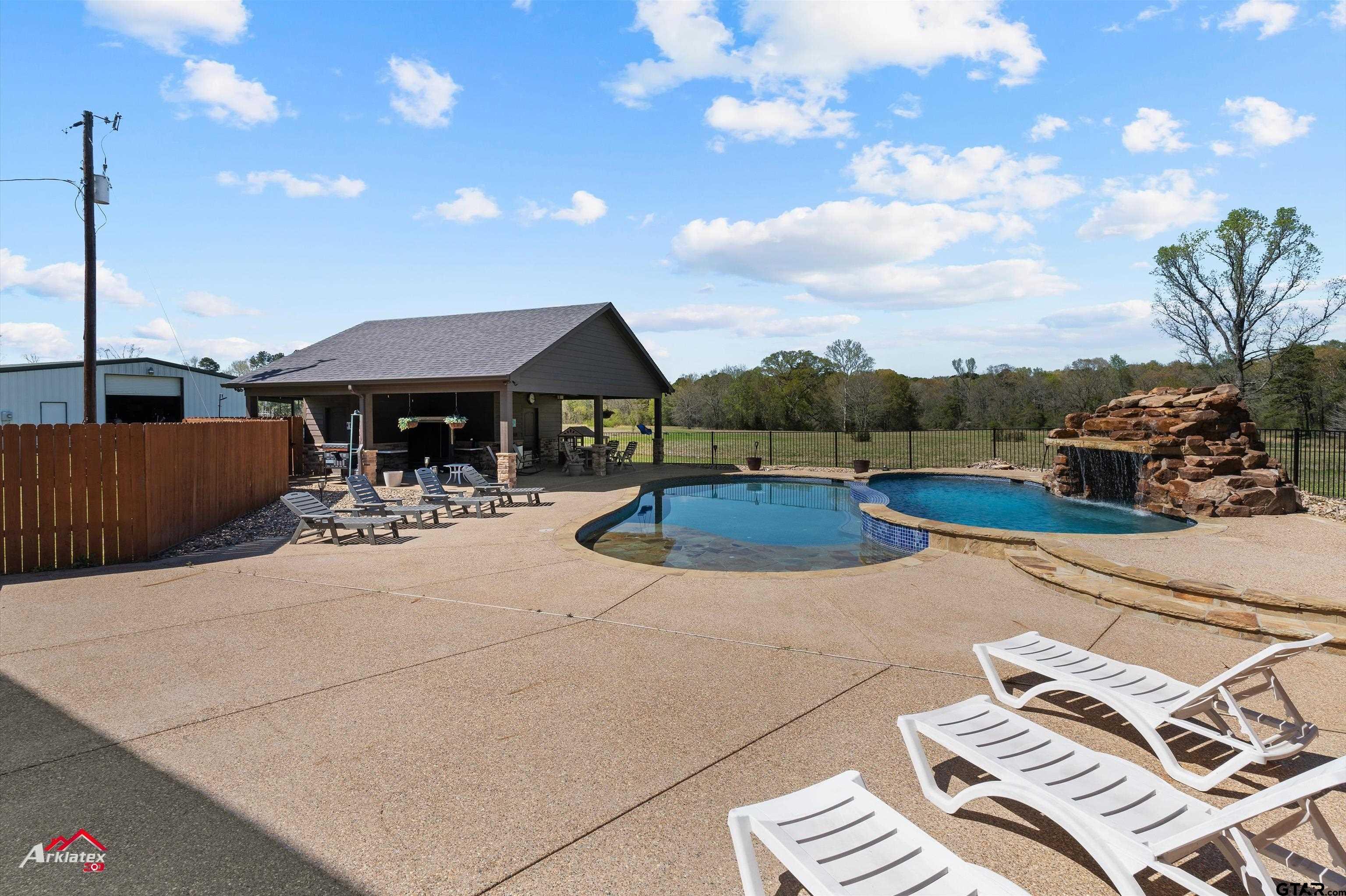2150 County Road 121 Gary, TX 75643 - Photo 3 of 35 a view of a patio with chairs and plants