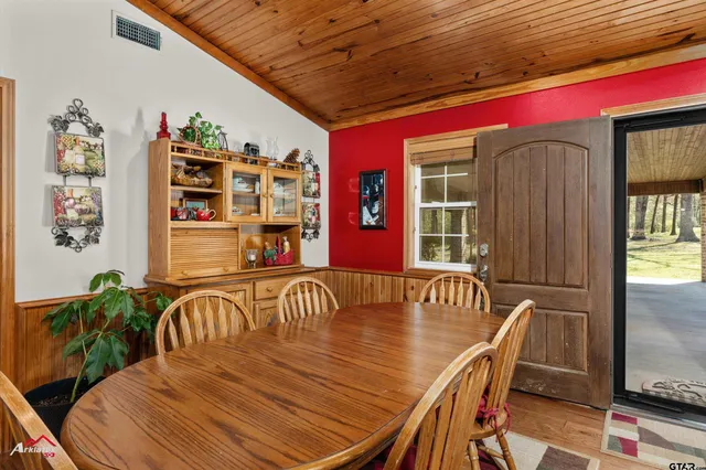 a view of a dining room with furniture