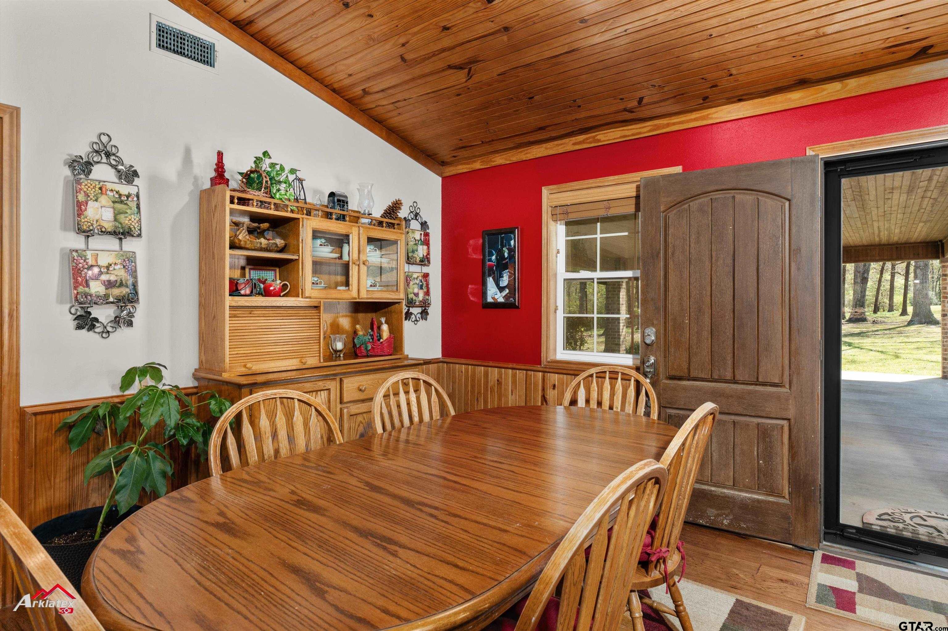 2150 County Road 121 Gary, TX 75643 - Photo 6 of 35 a view of a dining room with furniture