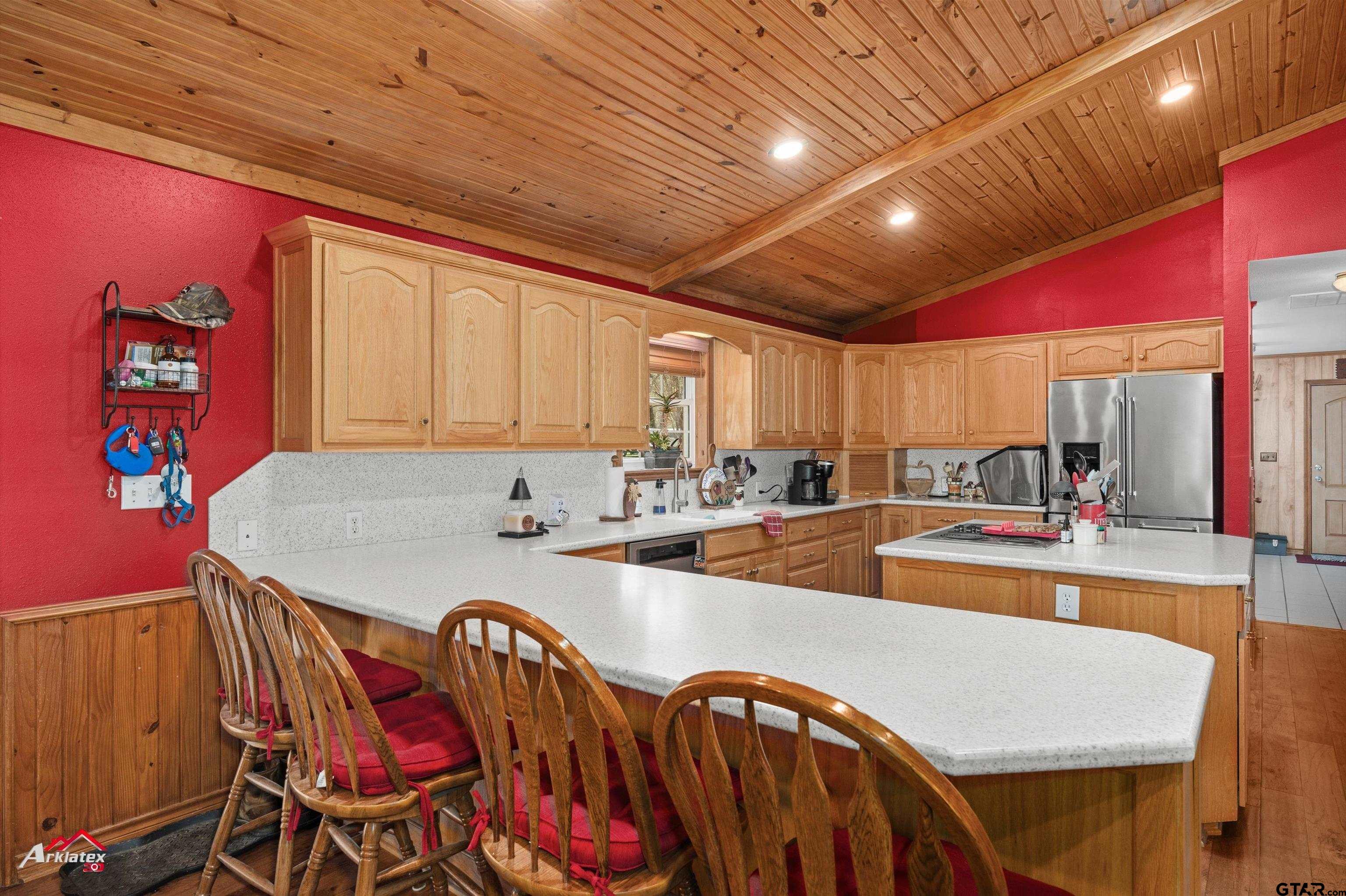 2150 County Road 121 Gary, TX 75643 - Photo 7 of 35 a large kitchen with a table and chairs