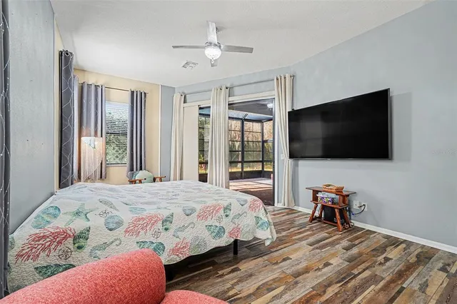 a bath room with a toilet and a bath tub