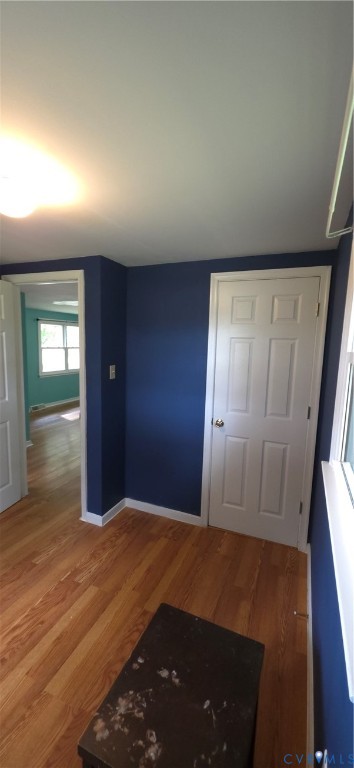 2519 Buckner Road Bumpass, VA 23024 - Photo 12 of 13 wooden floor in an empty room with a window