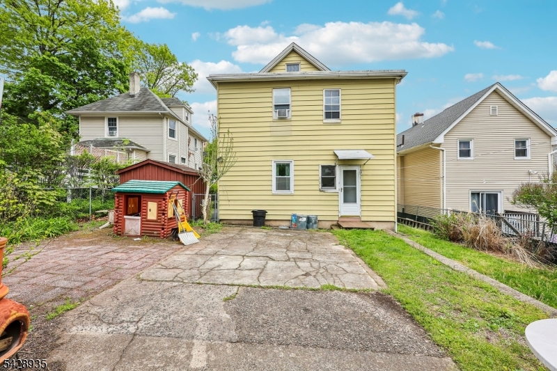 50 Preston Street Ridgefield Park, NJ 07660 - Photo 40 of 41 a view of a house with a yard