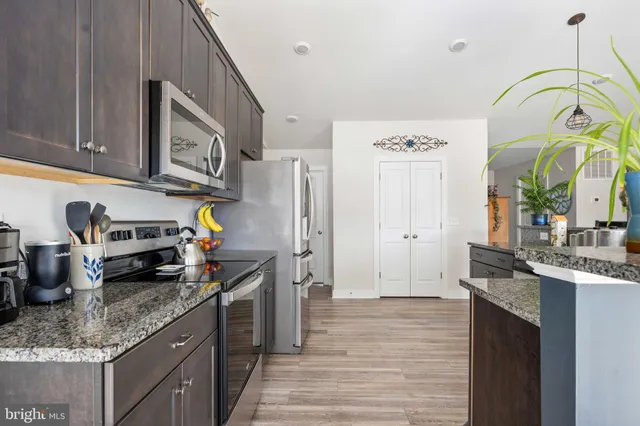 a bedroom with a bed and a windows