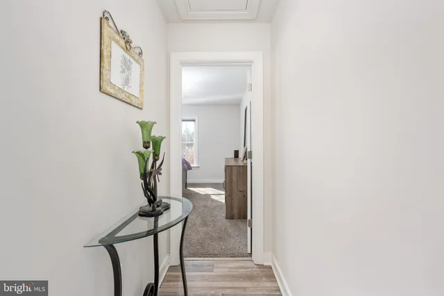 a bathroom with a sink a toilet a shower and a mirror