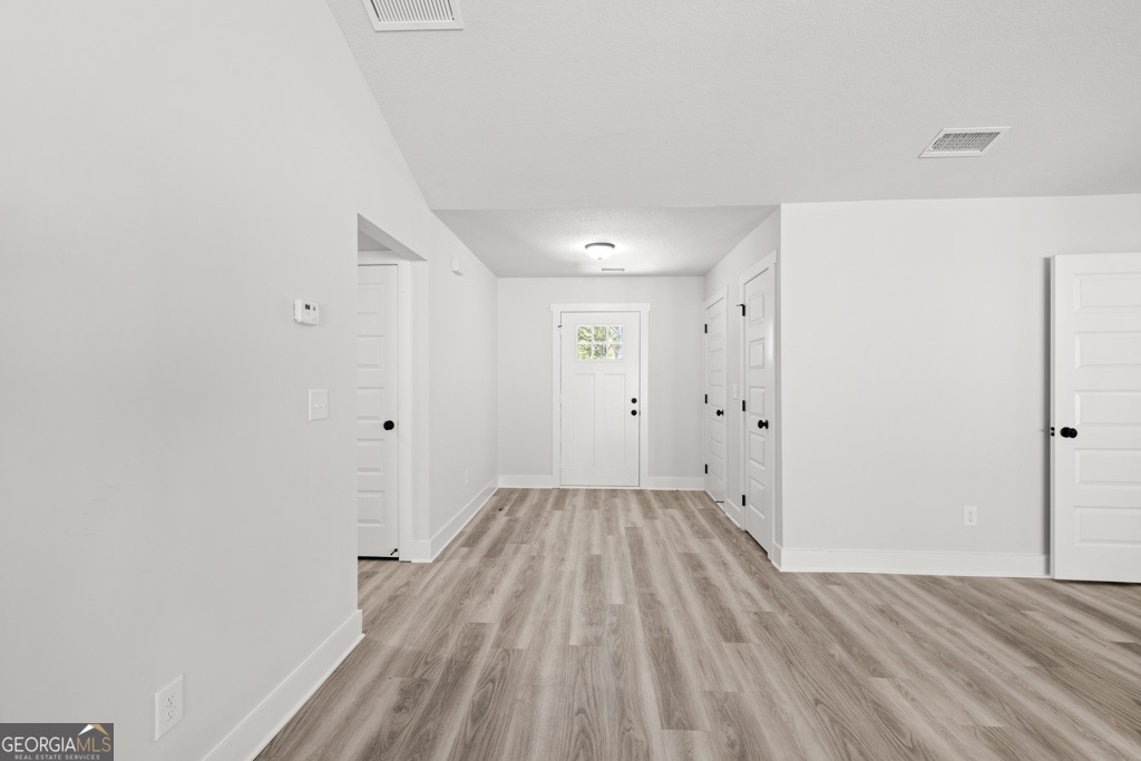 522 Oil Mill Road, Unit 10 Martin, GA 30557 - Photo 12 of 30 a view of a room with wooden floor