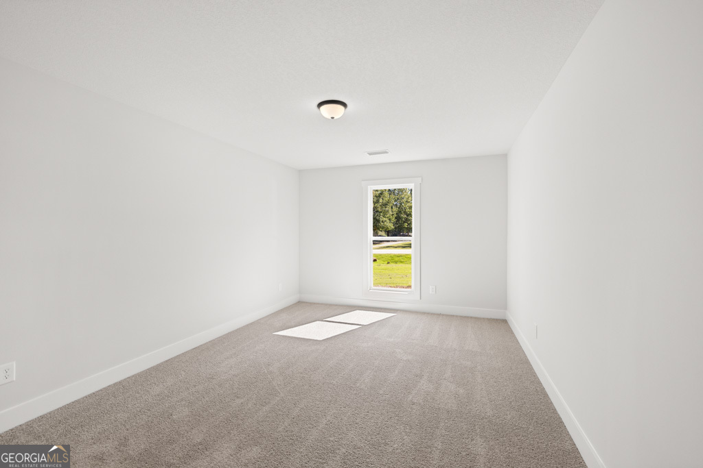 522 Oil Mill Road, Unit 10 Martin, GA 30557 - Photo 16 of 30 an empty room with a window