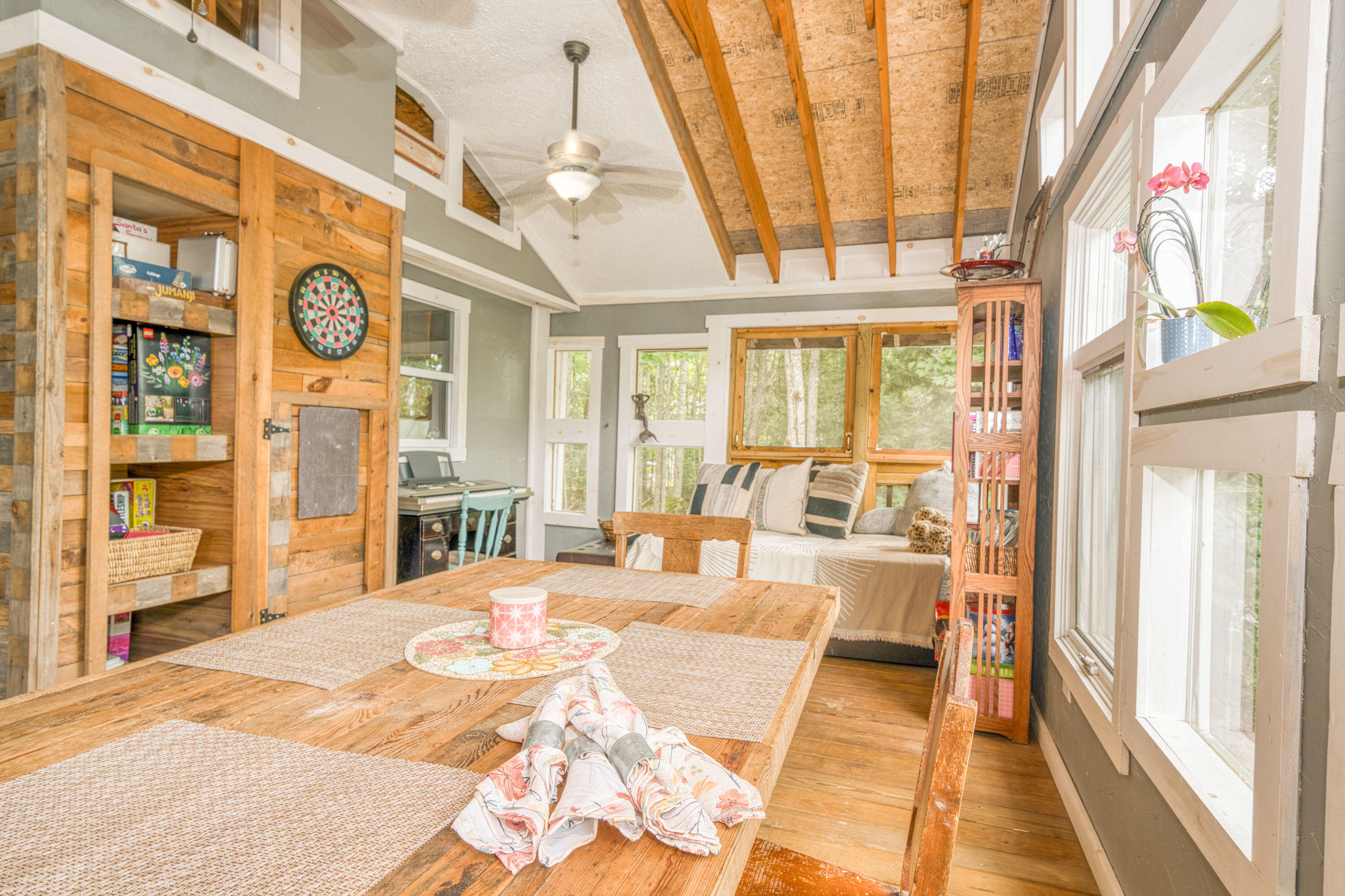 999 Brewer Lake Road Orrington, ME 04474 - Photo 7 of 36 Screened porch toward inside wall and va