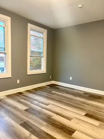 a view of a room and window