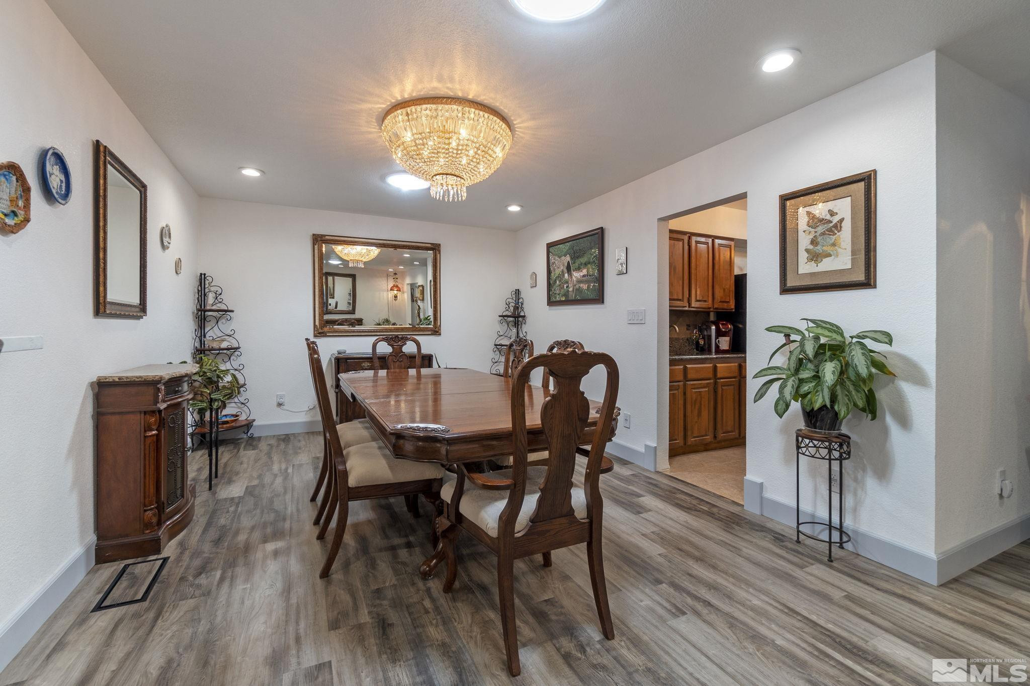 525 Main Street Gerlach, NV 89412 - Photo 19 of 40 a view of a dining room with furniture and wooden floor