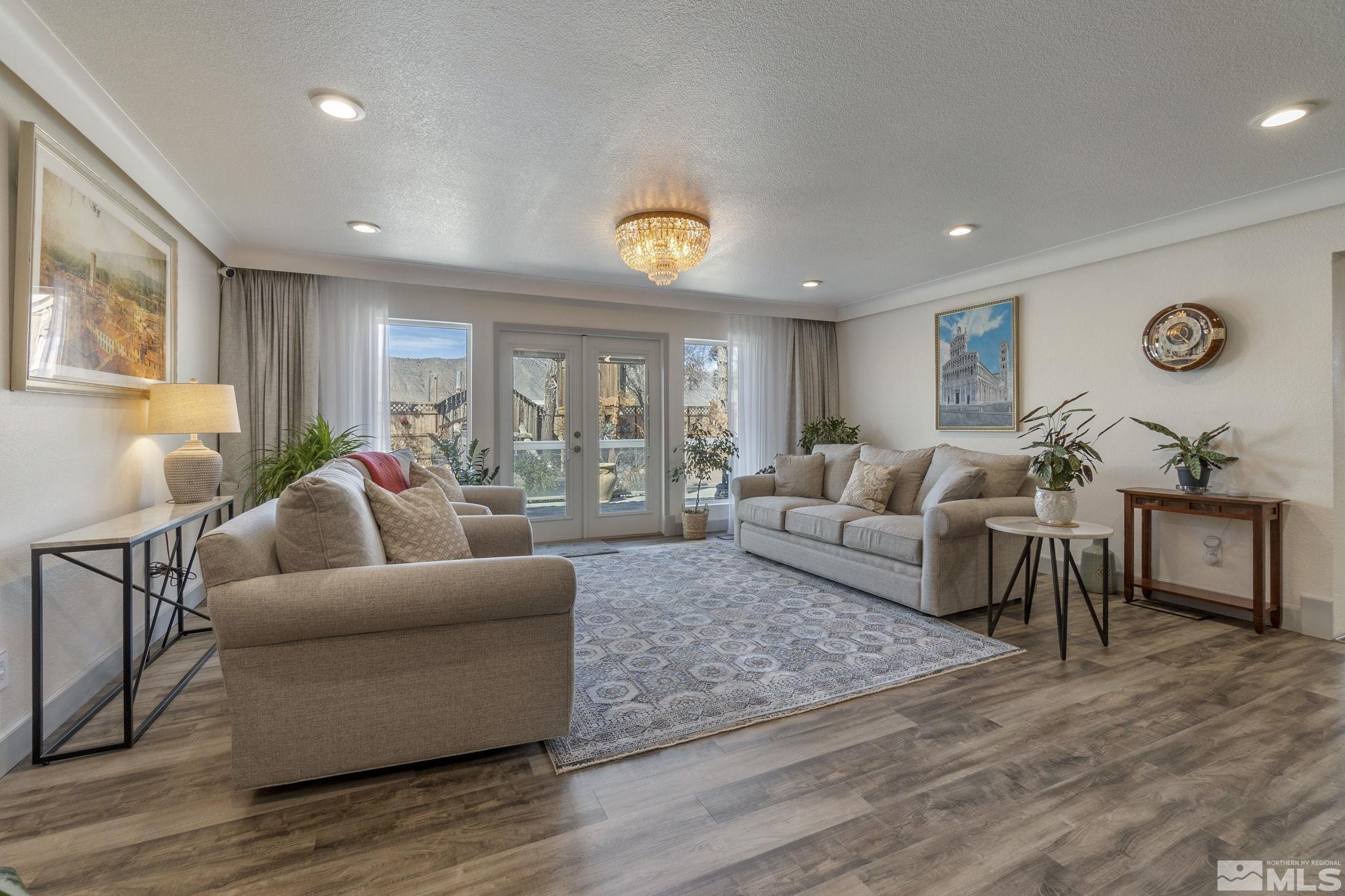 525 Main Street Gerlach, NV 89412 - Photo 20 of 40 a living room with furniture and a wooden floor