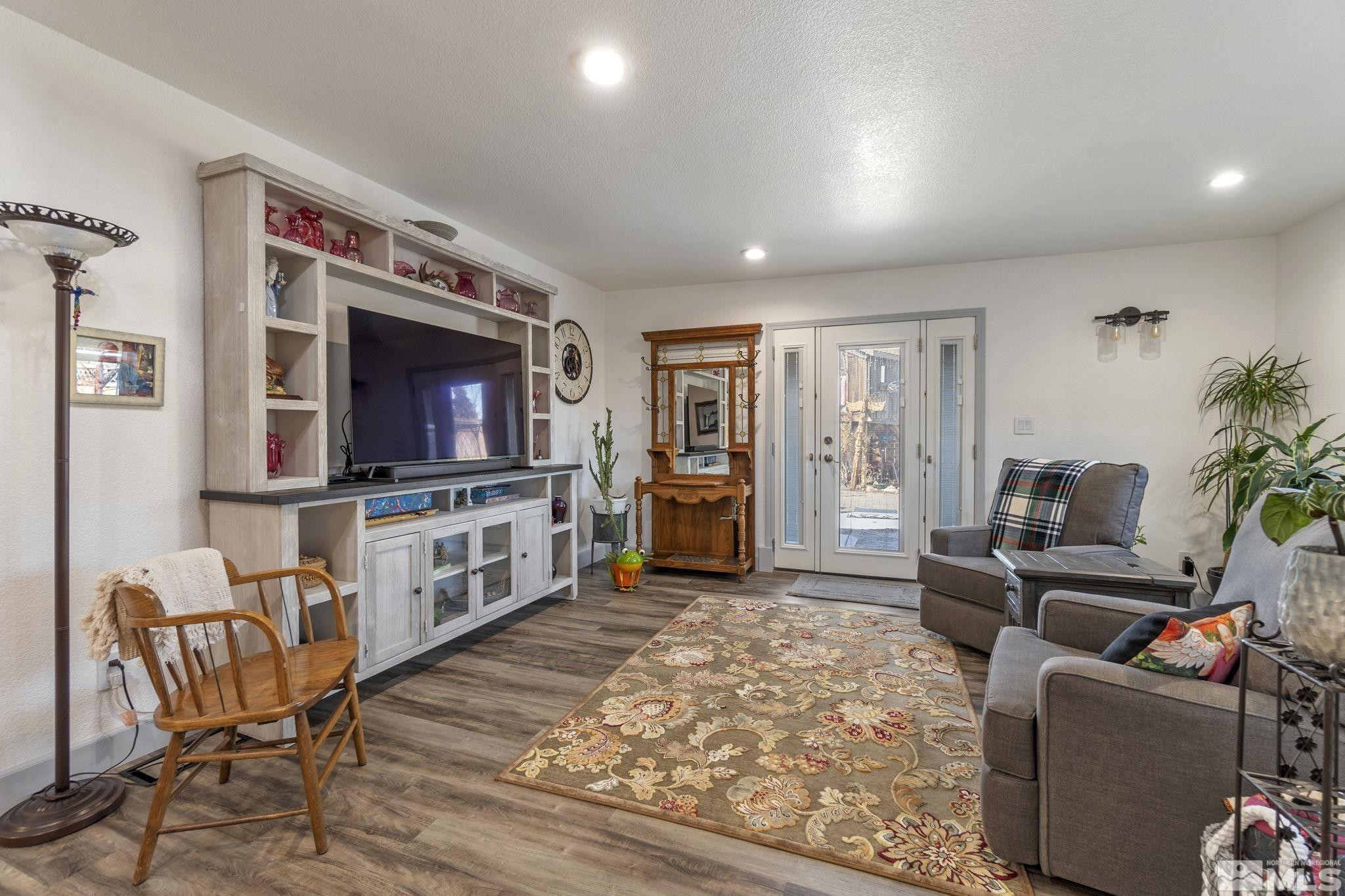525 Main Street Gerlach, NV 89412 - Photo 24 of 40 a living room with furniture and a flat screen tv
