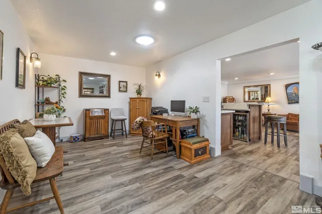 a living room with furniture and a table