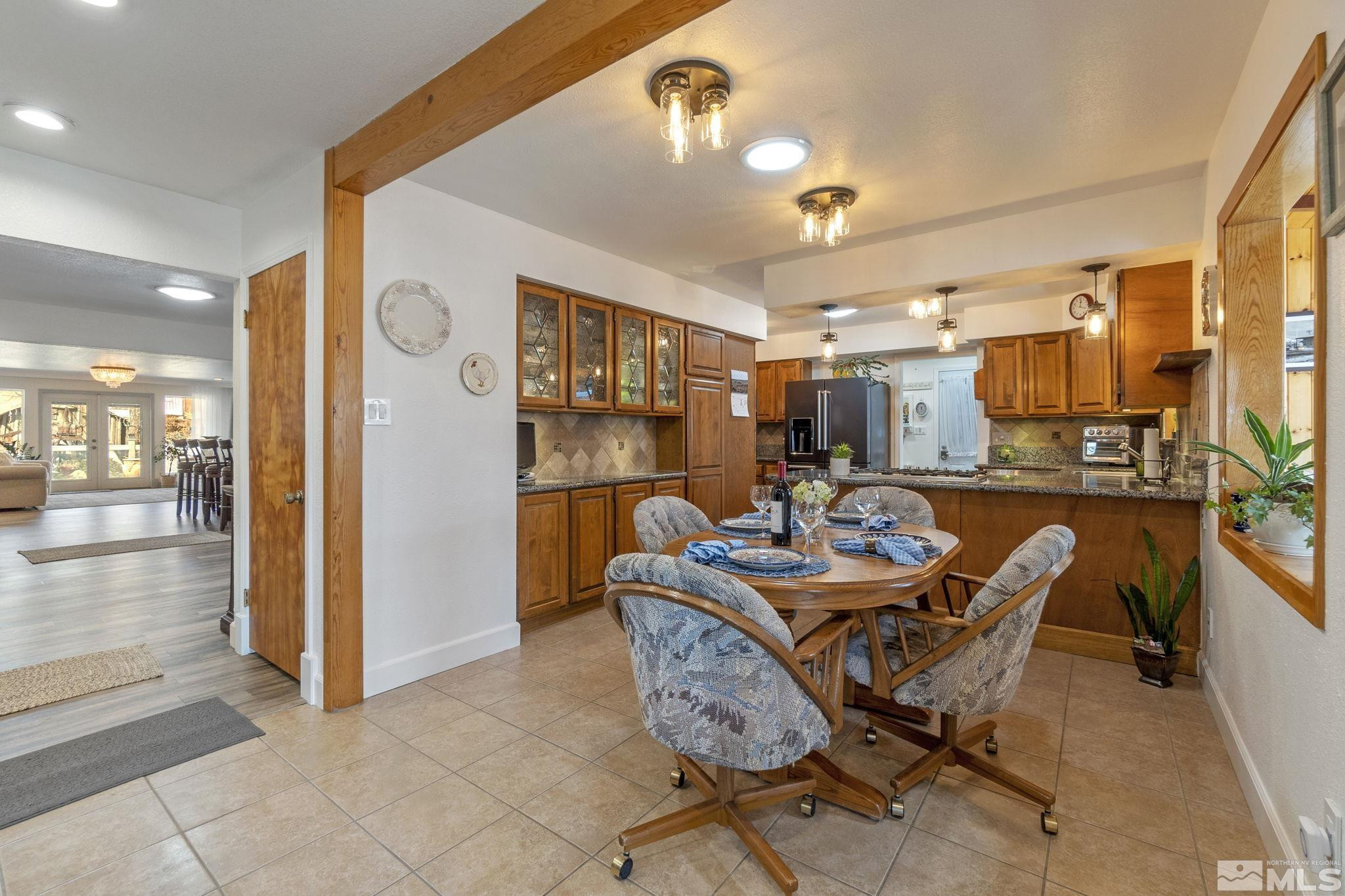 525 Main Street Gerlach, NV 89412 - Photo 10 of 40 a dining room with furniture and window