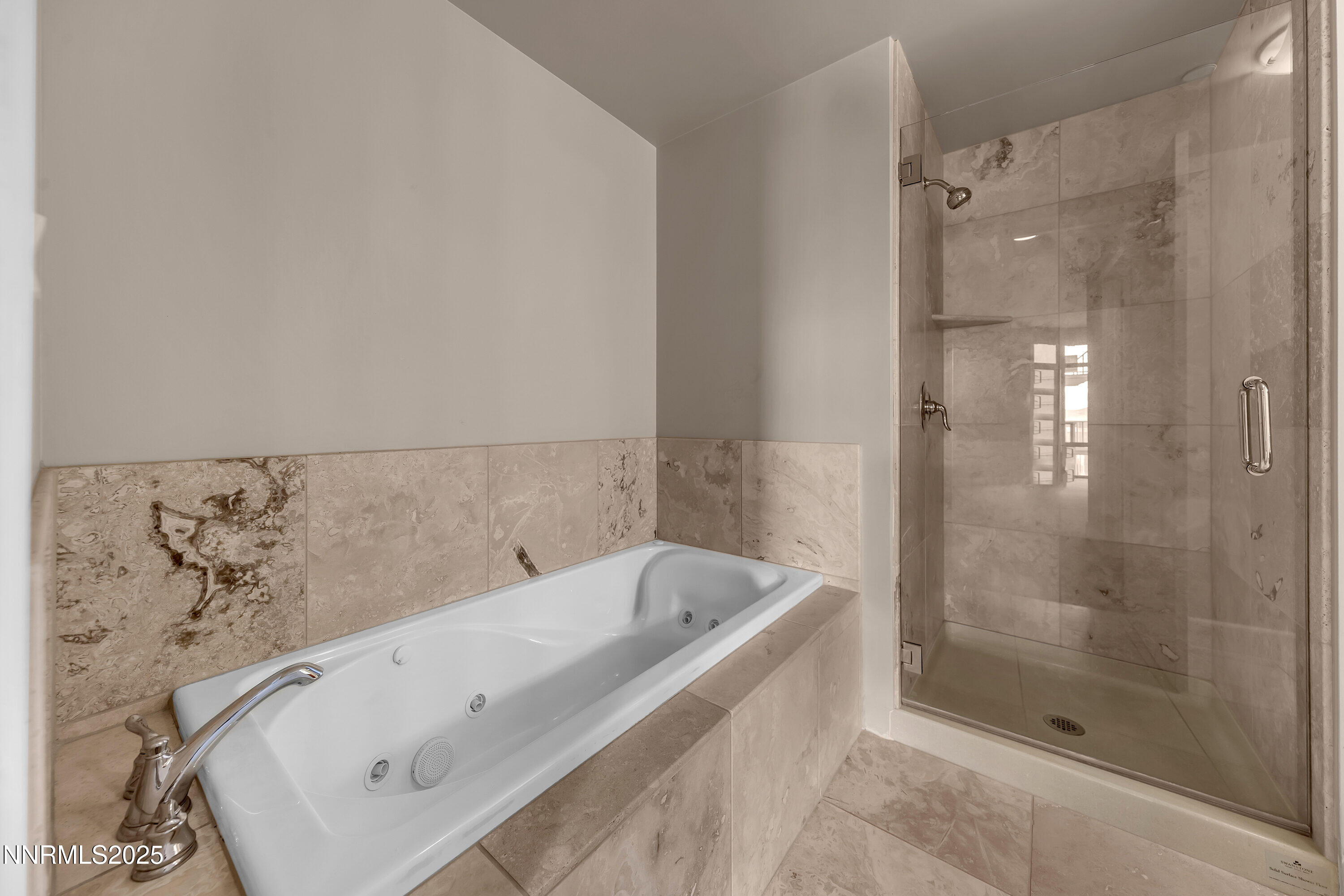 50 North Sierra Street, Unit 910 Reno, NV 89501 - Photo 14 of 20 a bathroom with a bathtub and shower