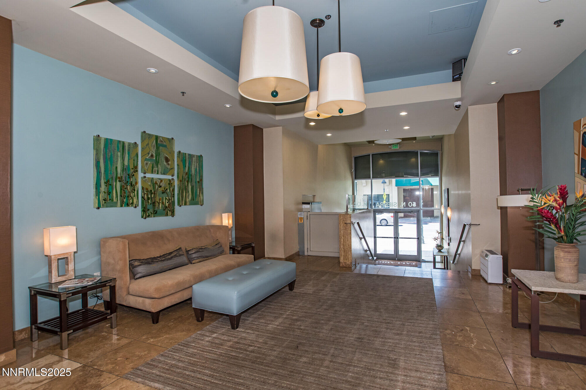 50 North Sierra Street, Unit 910 Reno, NV 89501 - Photo 17 of 20 a living room with furniture and a large window