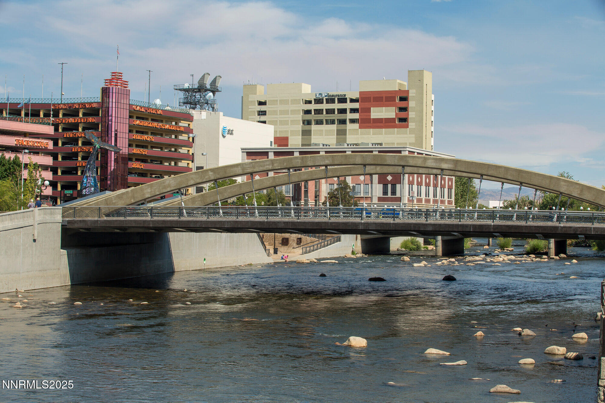 50 North Sierra Street, Unit 910 Reno, NV 89501 - Photo 20 of 20 a living room with lots of furniture and clutter