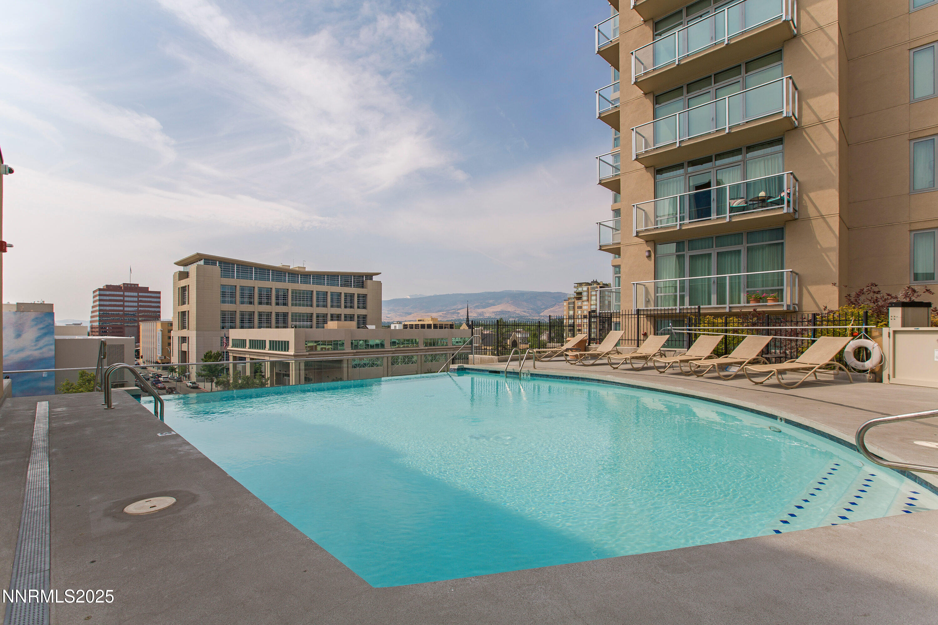 50 North Sierra Street, Unit 910 Reno, NV 89501 - Photo 3 of 20 a view of a swimming pool with outdoor space