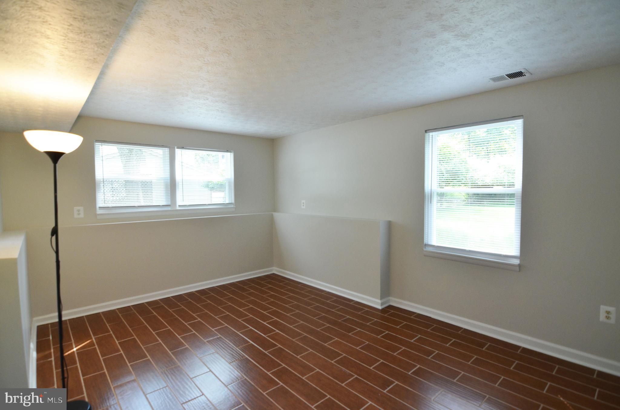 9251 Perfect Hour Columbia, MD 21045 - Photo 12 of 19 Lower level Rec/Flex space