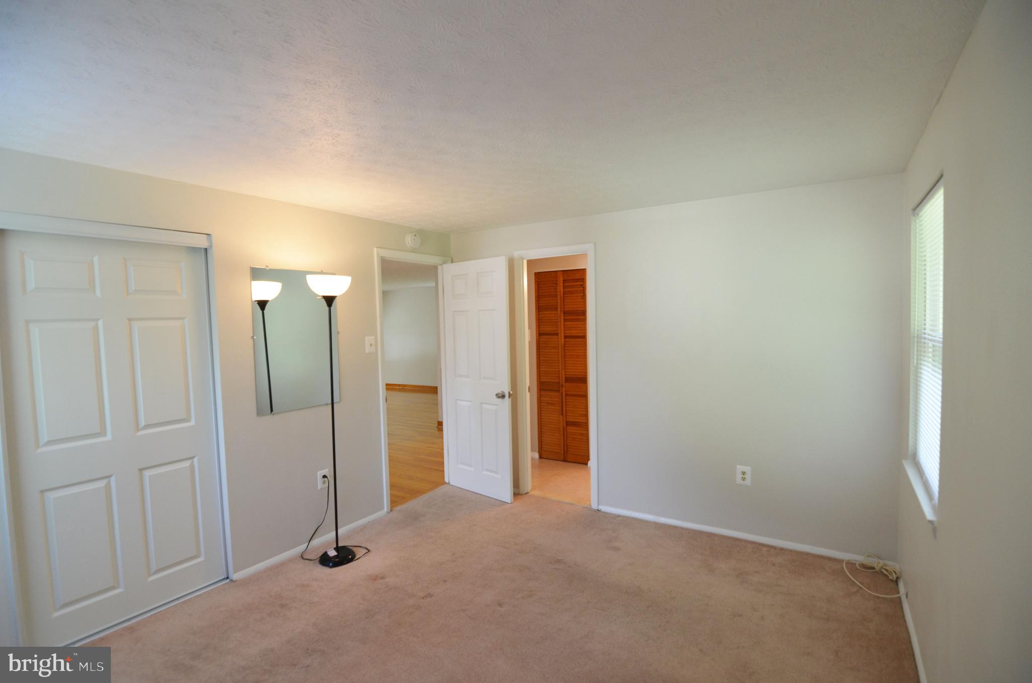 9251 Perfect Hour Columbia, MD 21045 - Photo 10 of 19 Main level bedroom with access to bath
