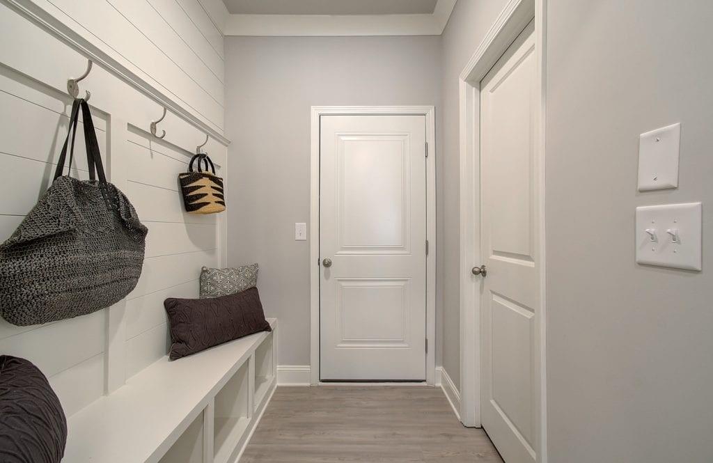 663 Secret Garden Lane Dacula, GA 30019 - Photo 21 of 27 a bathroom with a sink and a mirror