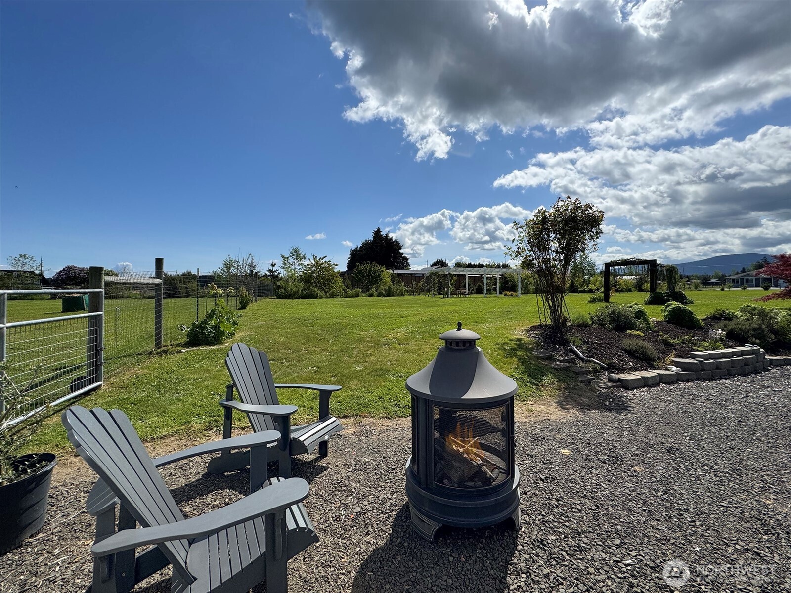 152 Macleay Road Sequim, WA 98382 - Photo 13 of 40 a view of a patio with chair and table