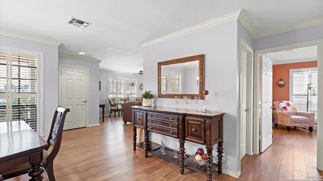a view of a livingroom with furniture and a wooden floor