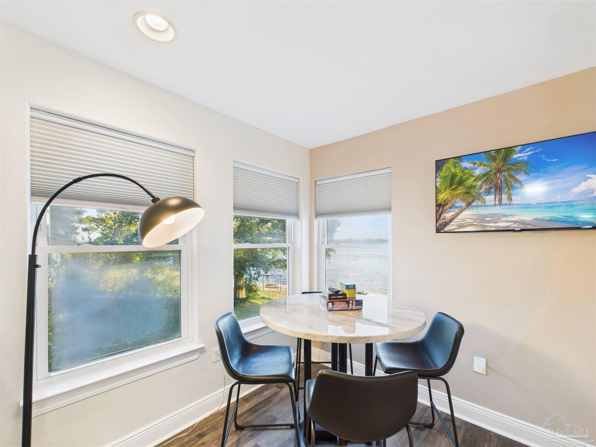39 Mariners Lane Mary Esther, FL 32569 - Photo 28 of 70 a view of a dining room with furniture and window