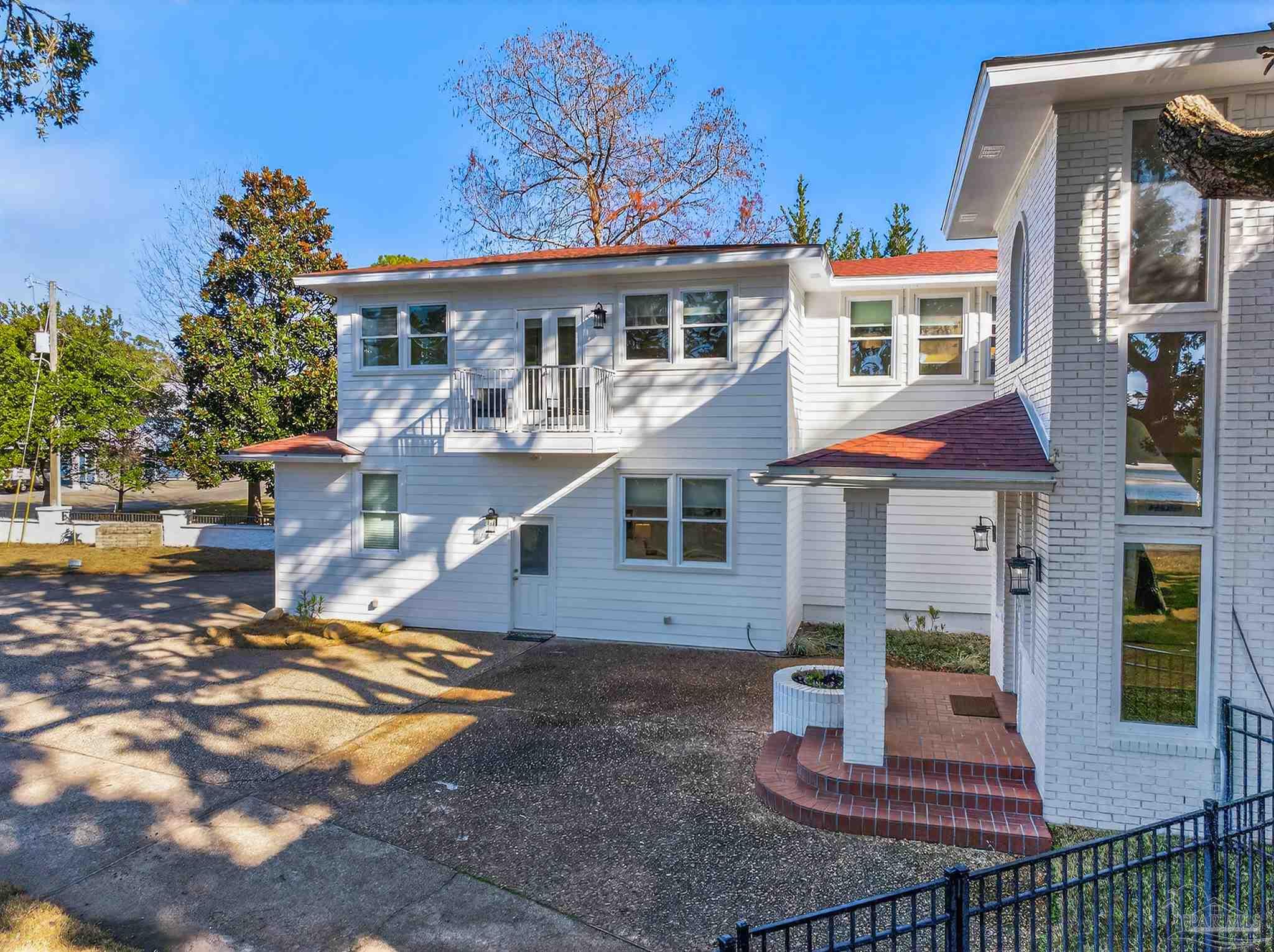 39 Mariners Lane Mary Esther, FL 32569 - Photo 4 of 70 a front view of a house with a yard