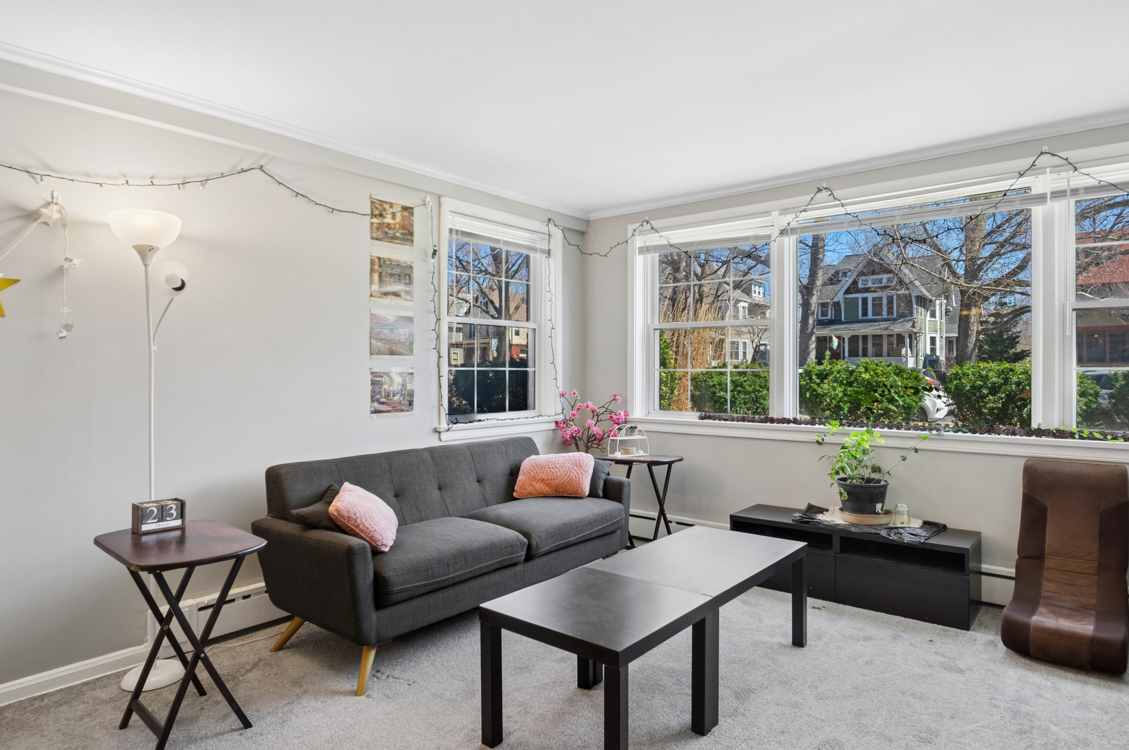 2242 Sherman Avenue, Unit G Evanston, IL 60201 - Photo 5 of 17 a living room with furniture and a large window