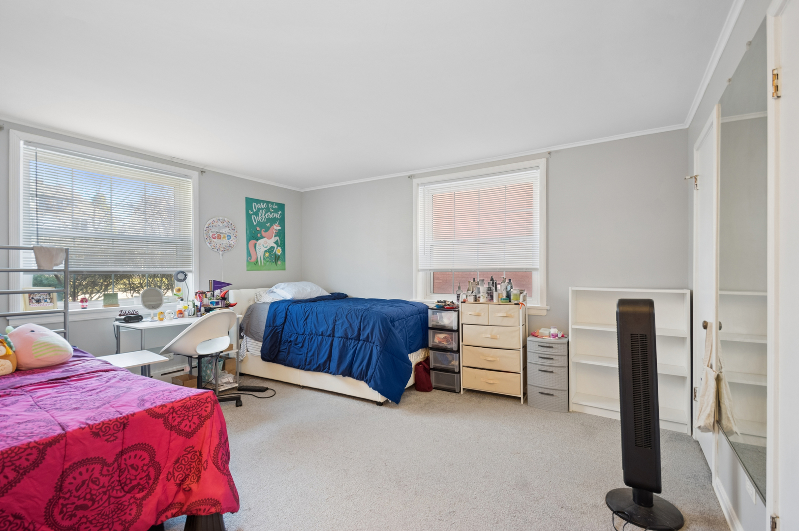2242 Sherman Avenue, Unit G Evanston, IL 60201 - Photo 10 of 17 a bedroom with a bed and a dresser