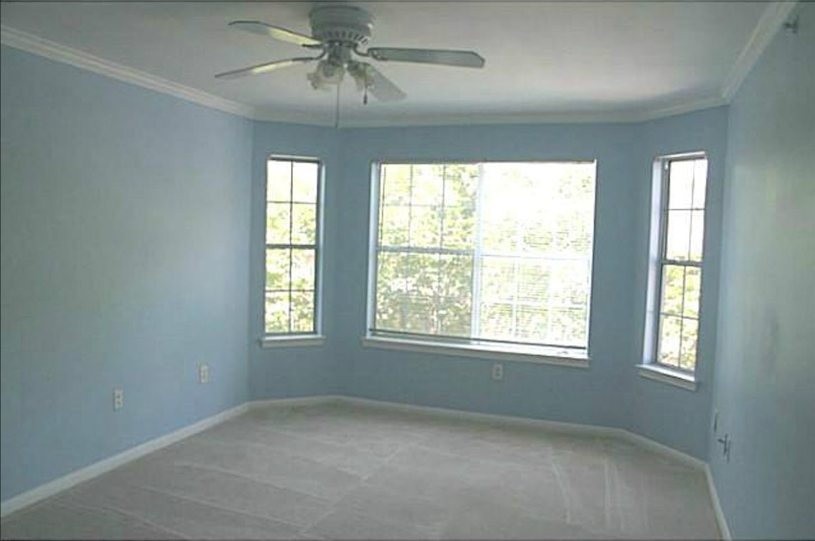 501 West 26th Street, Unit 104 Austin, TX 78705 - Photo 3 of 10 a view of an empty room with a window