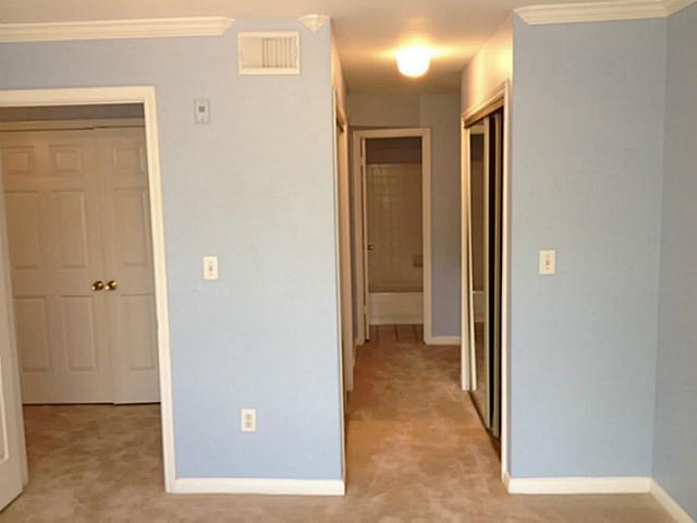 501 West 26th Street, Unit 104 Austin, TX 78705 - Photo 4 of 10 a view of a livingroom and a hallway
