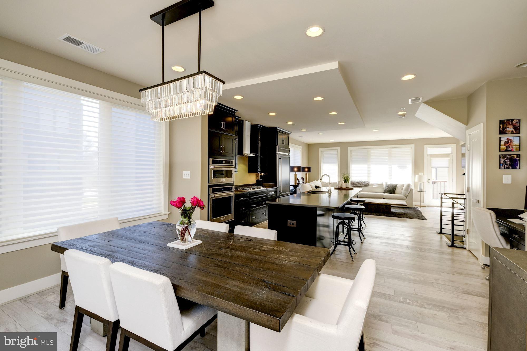 6640 Eames Way Bethesda, MD 20817 - Photo 14 of 38 a view of a dining room and livingroom view