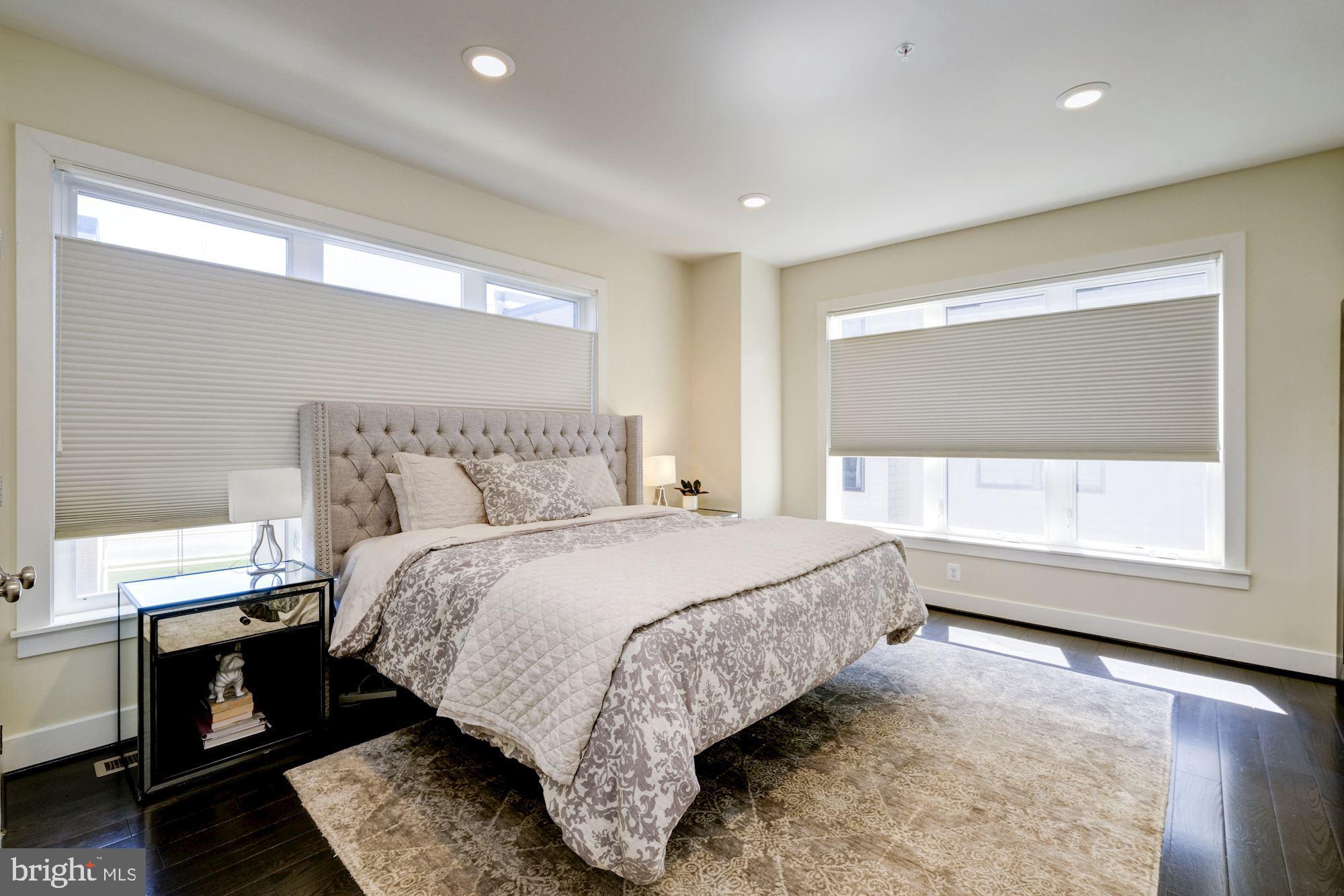 6640 Eames Way Bethesda, MD 20817 - Photo 17 of 38 a bedroom with a bed and a window