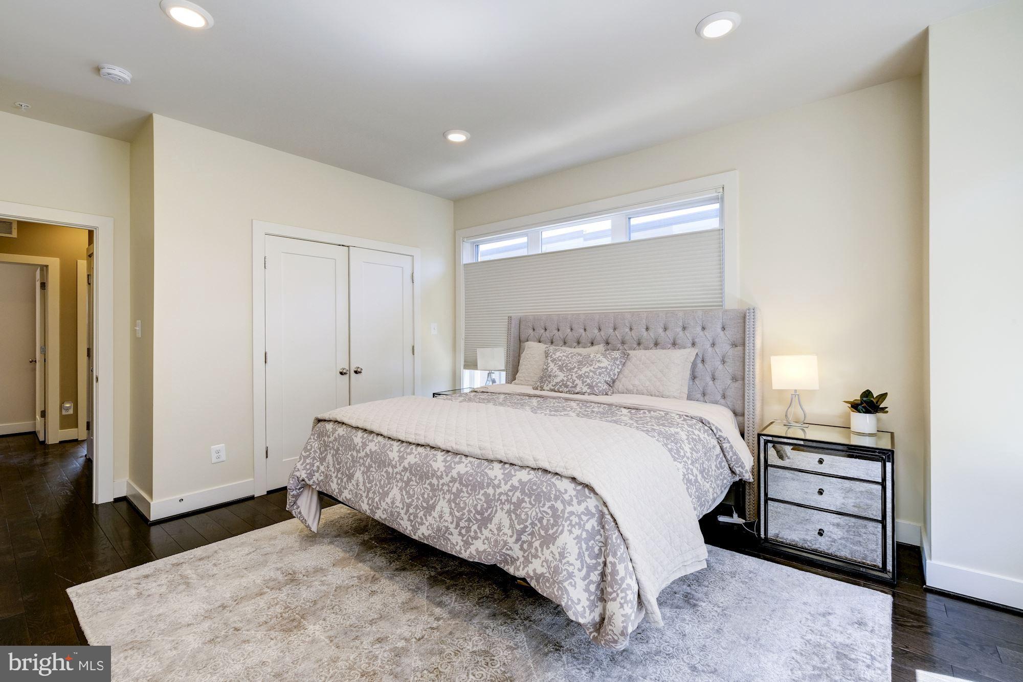 6640 Eames Way Bethesda, MD 20817 - Photo 18 of 38 a bedroom with a bed and a cabinets