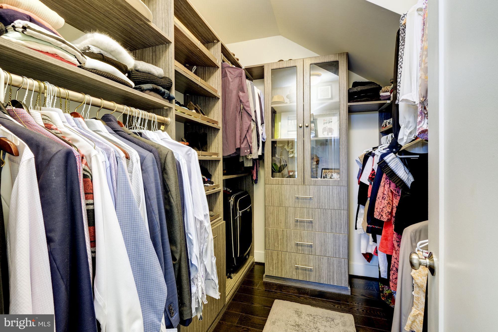 6640 Eames Way Bethesda, MD 20817 - Photo 20 of 38 a view of walk in closet with clothes and shoes